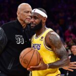 Former Los Angeles Lakers player Kareem Abdul-Jabbar hugs forward LeBron James (6) after James becomes the all time NBA scoring leader againt the Oklahoma City Thunder during the second half at Crypto.com Arena