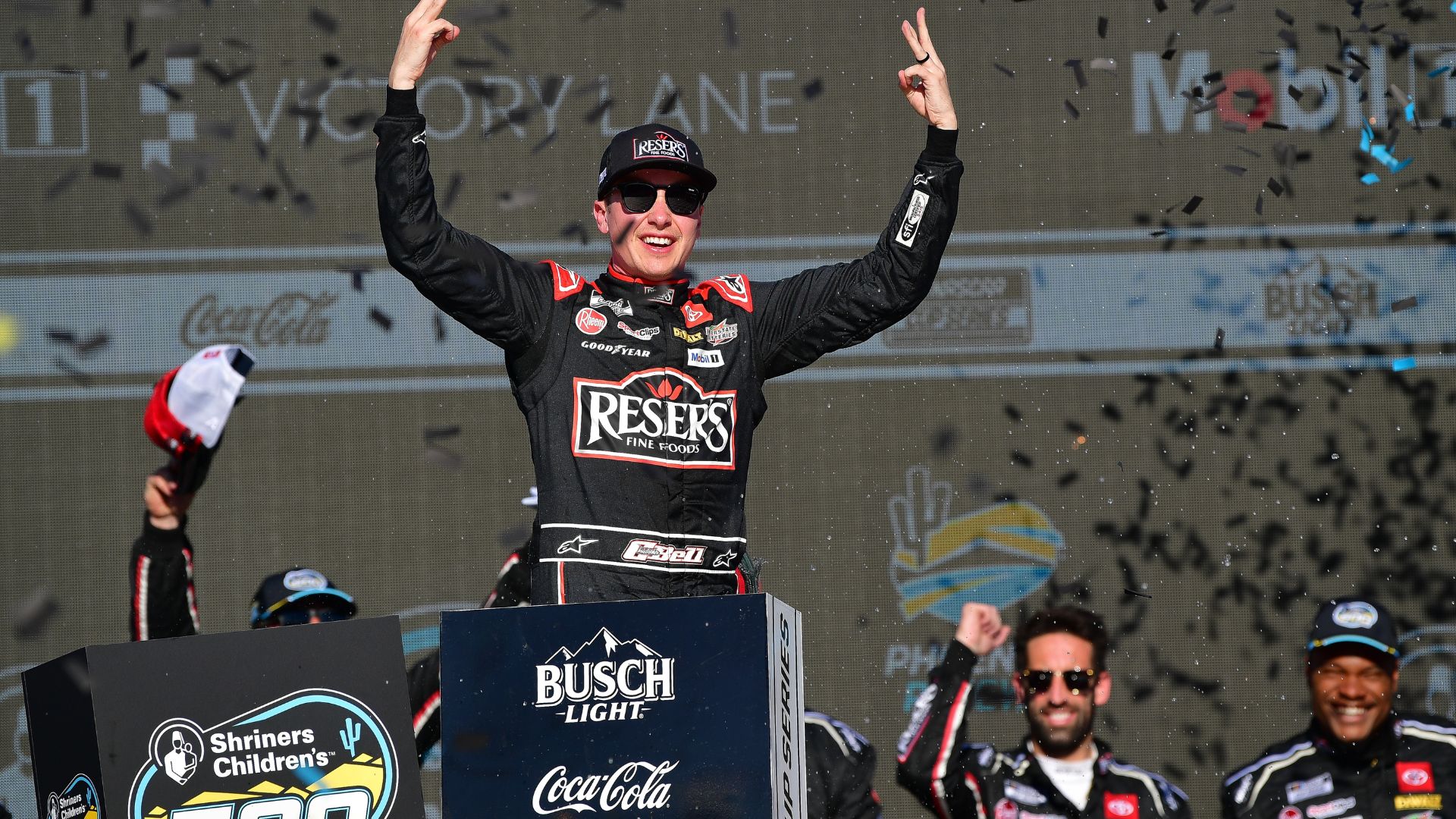 Mar 9, 2025; Avondale, Arizona, USA; NASCAR Cup Series driver Christopher Bell (20) celebrates his victory of the Shriners Children’s 500 at Phoenix Raceway.