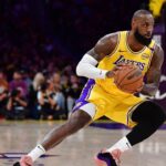 Los Angeles Lakers forward LeBron James (23) controls the ball against the Minnesota Timberwolves during the first half in game five of first round for the 2025 NBA Playoffs at Crypto.com Arena.