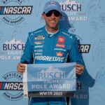 NASCAR Cup Series driver Denny Hamlin (11) poses for a photo after winning the pole award after practice and qualifying for the Enjoy Illinois 300 at World Wide Technology Raceway.