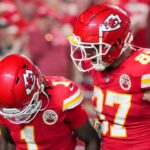 Kansas City Chiefs tight end Travis Kelce (87) celebrates with wide receiver Xavier Worthy (1) after a touchdown agains the Baltimore Ravens during the second half at GEHA Field at Arrowhead Stadium.