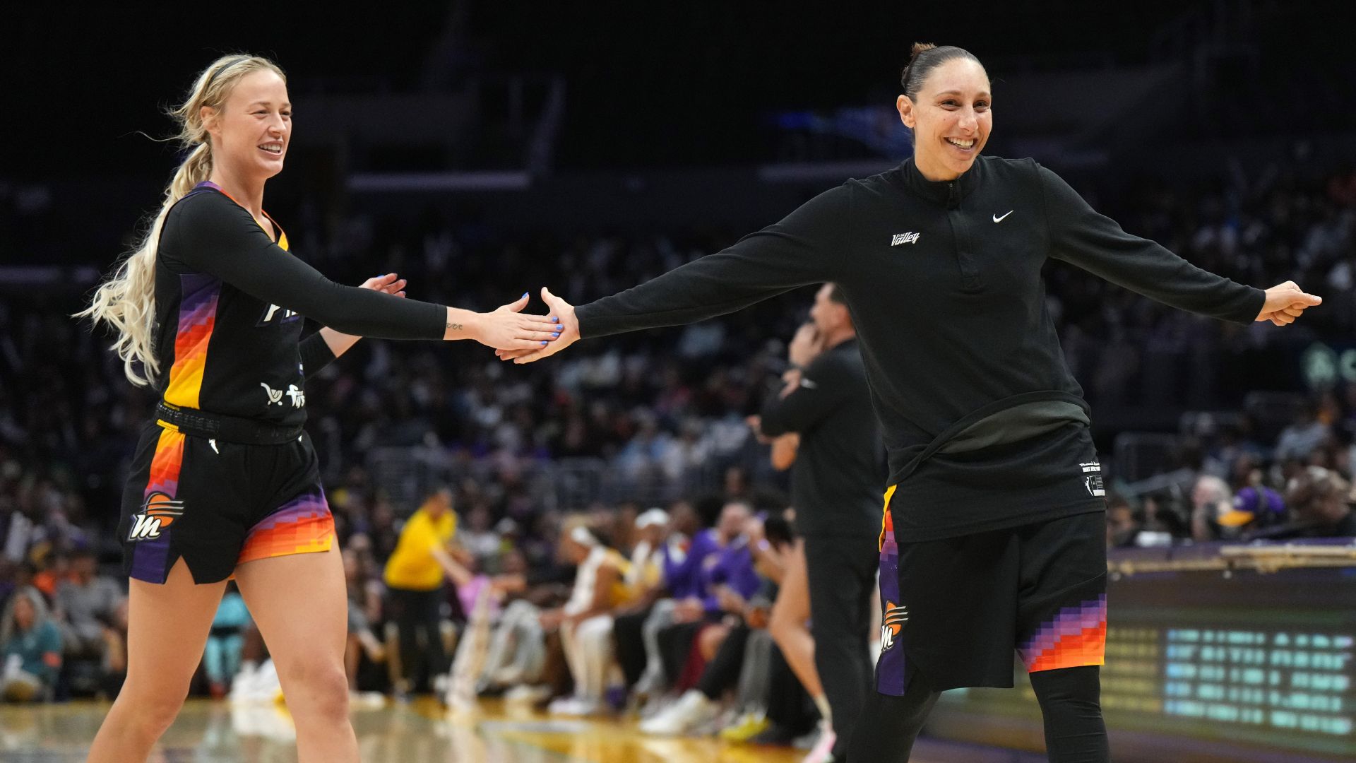Sep 17, 2024; Los Angeles, California, USA; Phoenix Mercury guard Sophie Cunningham (9) and guard Diana Taurasi (3) celebrate in the second half against the LA Sparks at Crypto.com Arena.