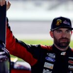 Feb 12, 2025; Daytona Beach, Florida, USA; NASCAR Cup Series driver Corey LaJoie (01) during qualifying for the Daytona 500 at Daytona International Speedway