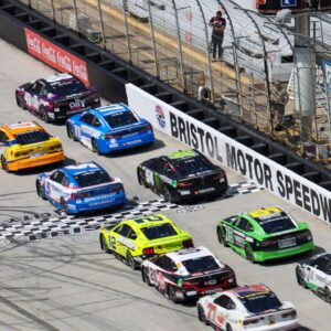 The green flag is waved to start the NASCAR Food City 500 at Bristol Motor Speedway.