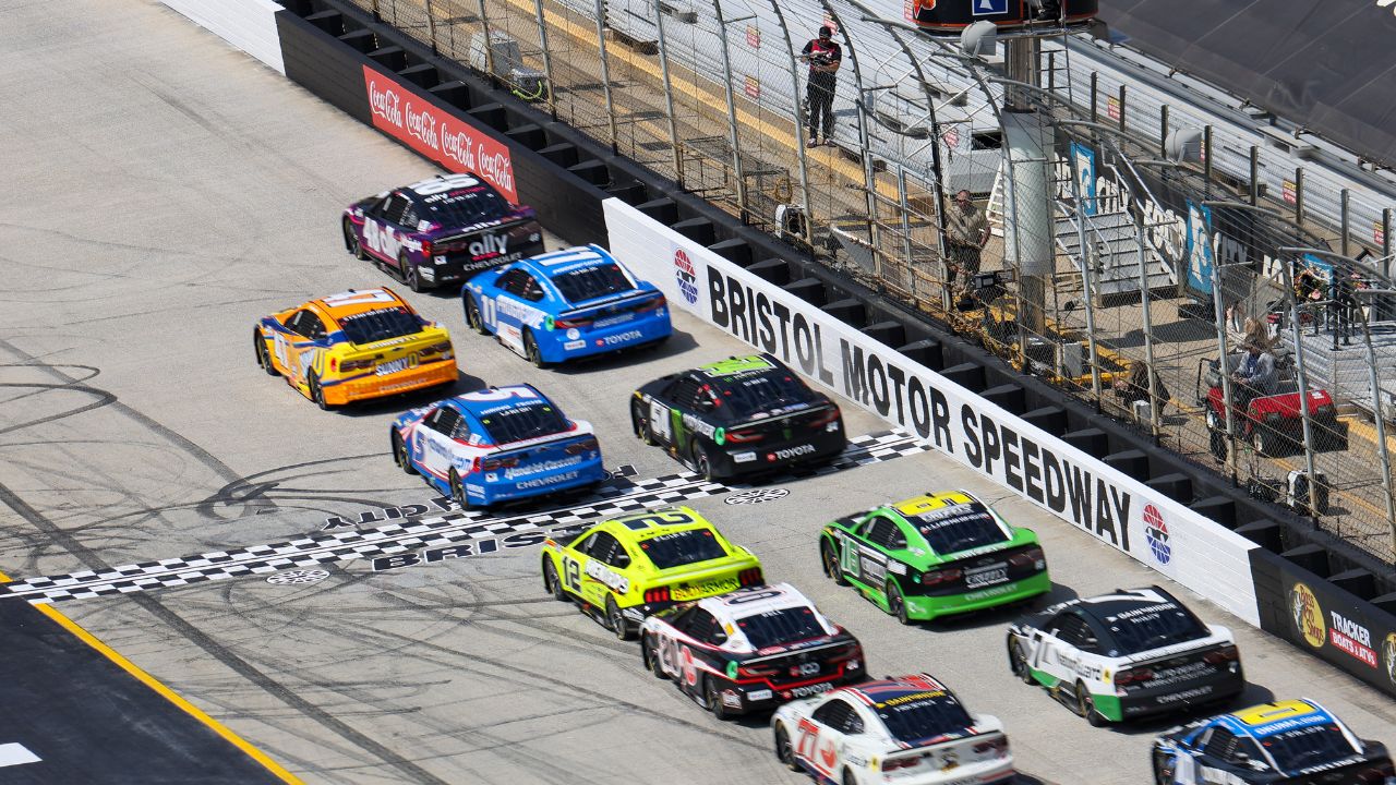 The green flag is waved to start the NASCAR Food City 500 at Bristol Motor Speedway.