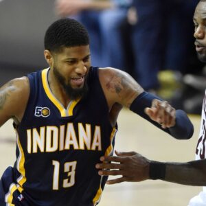 Apr 2, 2017; Cleveland, OH, USA; Indiana Pacers forward Paul George (13) drives against Cleveland Cavaliers forward LeBron James (23) in the second quarter at Quicken Loans Arena.
