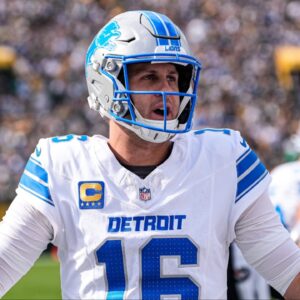 Detroit Lions quarterback Jared Goff (16) cheers up teammates on the sideline before a first down against Green Bay Packers during the first half at Lambeau Field in Green Bay, Wis., on Sunday, September 7, 2025.