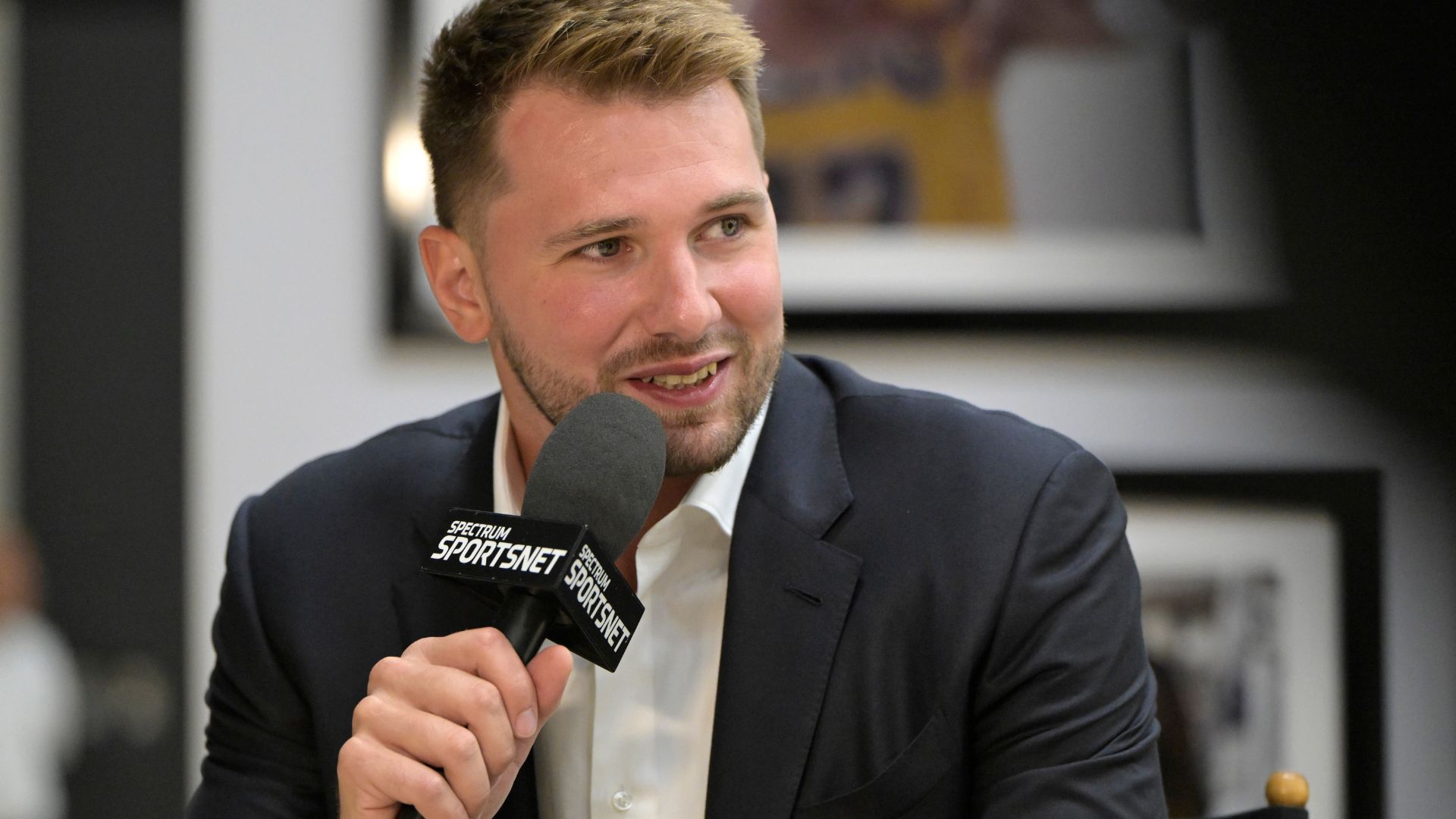Aug 2, 2025; El Segundo, CA, USA; Los Angeles Lakers Luka Doncic (77) is interviewed Spectrum SportsNet following a press conference announcing the signing of his contract extension at UCLA Health Training Center.