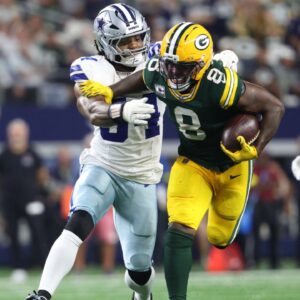 Packers running back Josh Jacobs and Cowboys defensive end Sam Williams