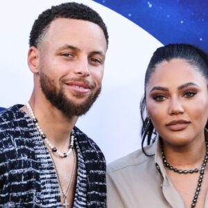 American professional basketball player Stephen Curry and wife/Canadian-American actress Ayesha Curry arrive at the World Premiere Of Universal Pictures' 'Nope' held at the TCL Chinese Theatre IMAX