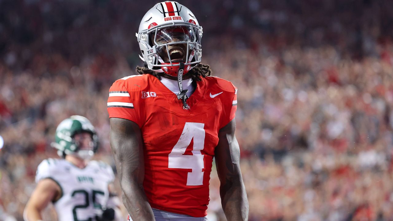 Ohio State Buckeyes wide receiver Jeremiah Smith (4) celebrates his touchdown during the second half against the Ohio Bobcats at Ohio Stadium.