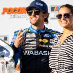 Team Penske's Ryan Blaney (12) poses with his fiancé Gianna Tulio on July 14, 2024