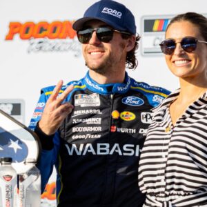 Team Penske's Ryan Blaney (12) poses with his fiancé Gianna Tulio on July 14, 2024