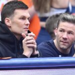 New England Patriots quarterback Tom Brady (left) and wide receiver Julian Edelman attend a game between the Syracuse Orange and the North Carolina Tar Heels at the Carrier Dome.