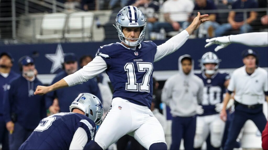 Dallas Cowboys place kicker Brandon Aubrey (17) kicks a field goal during the game against the Washington Commanders at AT&T Stadium.