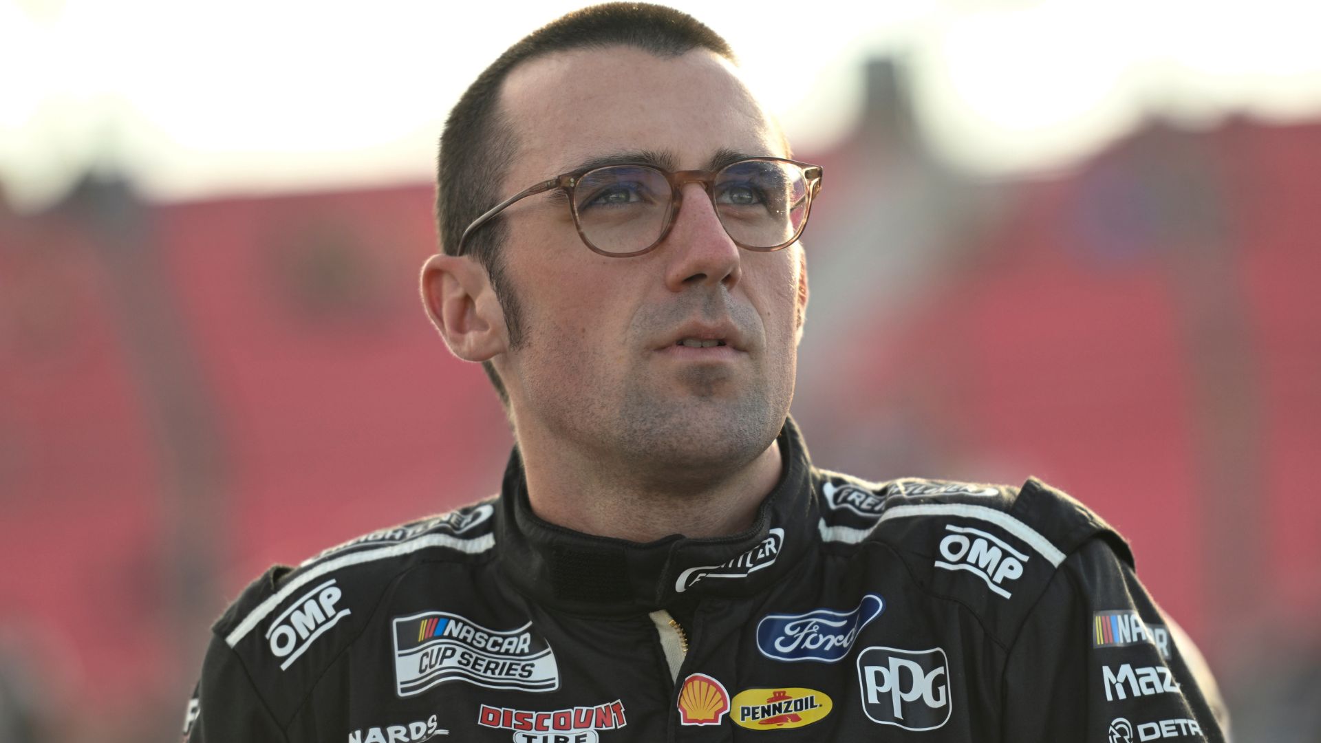 Sep 6, 2025; Madison, Illinois, USA; NASCAR Cup Series driver Austin Cindric (2) looks on during practice and qualifying for the Enjoy Illinois 300 at World Wide Technology Raceway.