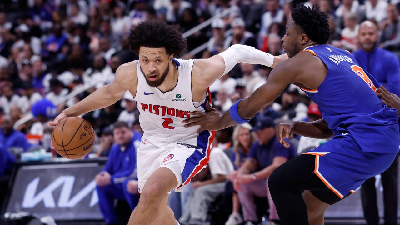 Detroit Pistons guard Cade Cunningham (2) dribbles defended by New York Knicks forward OG Anunoby (8) in the second half during game six of first round for the 2024 NBA Playoffs at Little Caesars Arena.