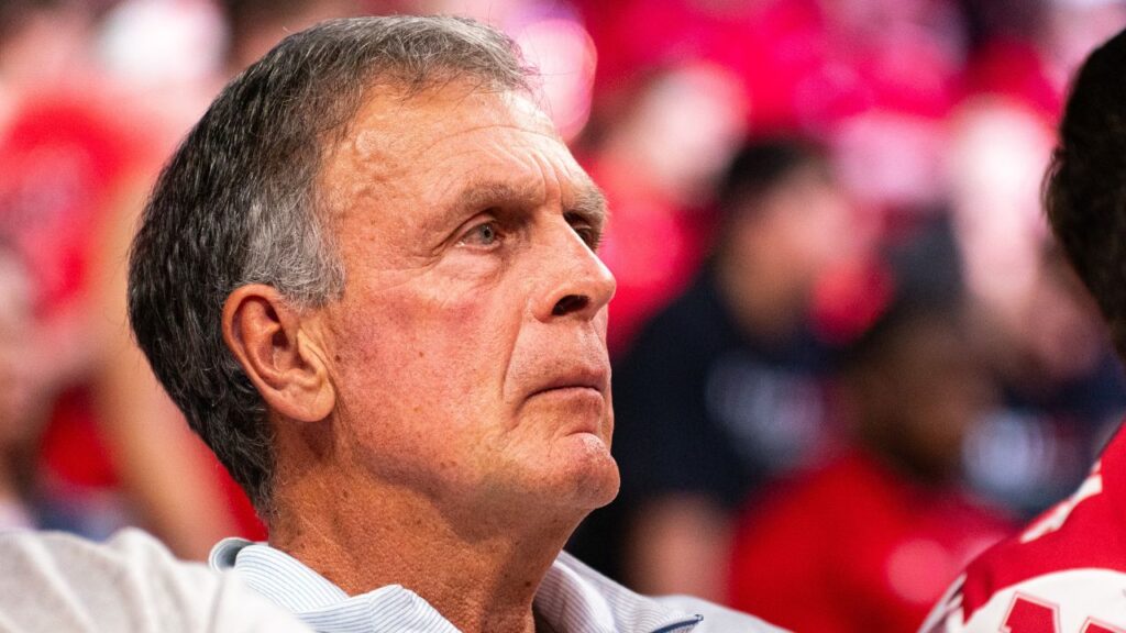 Mar 3, 2024; Lincoln, Nebraska, USA; Former NBA forward Kevin McHale sits court side during the second half between the Nebraska Cornhuskers and the Rutgers Scarlet Knights at Pinnacle Bank Arena.