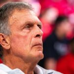 Mar 3, 2024; Lincoln, Nebraska, USA; Former NBA forward Kevin McHale sits court side during the second half between the Nebraska Cornhuskers and the Rutgers Scarlet Knights at Pinnacle Bank Arena.