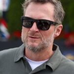 Jul 19, 2025; Dover, Delaware, USA; NASCAR Xfinity Series owner Dale Earnhardt Jr. looks on from pit road during the BetRivers 200 at Dover Motor Speedway