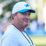 Jon Gruden watches practice during training camp at Meijer Performance Center in Allen Park on Monday, July 28, 2025.