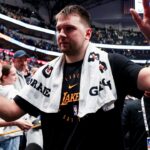 Los Angeles Lakers guard Luka Doncic (77) waves to fans after the game against the Dallas Mavericks at American Airlines Center.