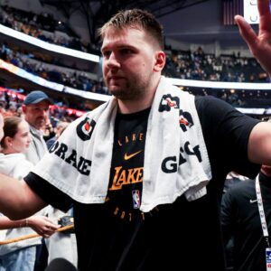 Los Angeles Lakers guard Luka Doncic (77) waves to fans after the game against the Dallas Mavericks at American Airlines Center.