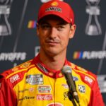 Joey Logano answers questions from the media during NASCAR Cup Series Playoff Media Day at Charlotte Convention Center.