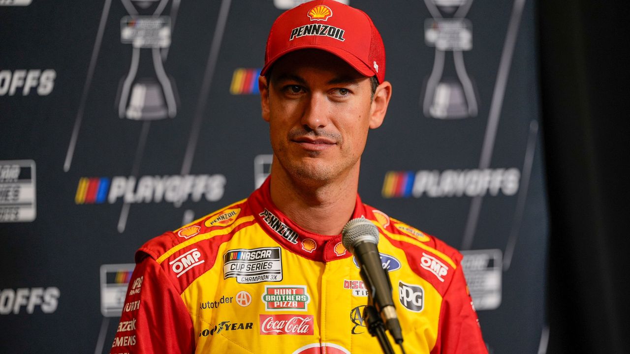Joey Logano answers questions from the media during NASCAR Cup Series Playoff Media Day at Charlotte Convention Center.