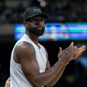 Dwyane Wade claps his hands during the game between the Chicago Sky and New York Liberty on Thursday