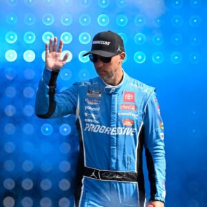 Sep 21, 2025; Loudon, New Hampshire, USA; NASCAR Cup Series driver Denny Hamlin (11) is introduced before the start of the Mobil 1 301 at New Hampshire Motor Speedway.
