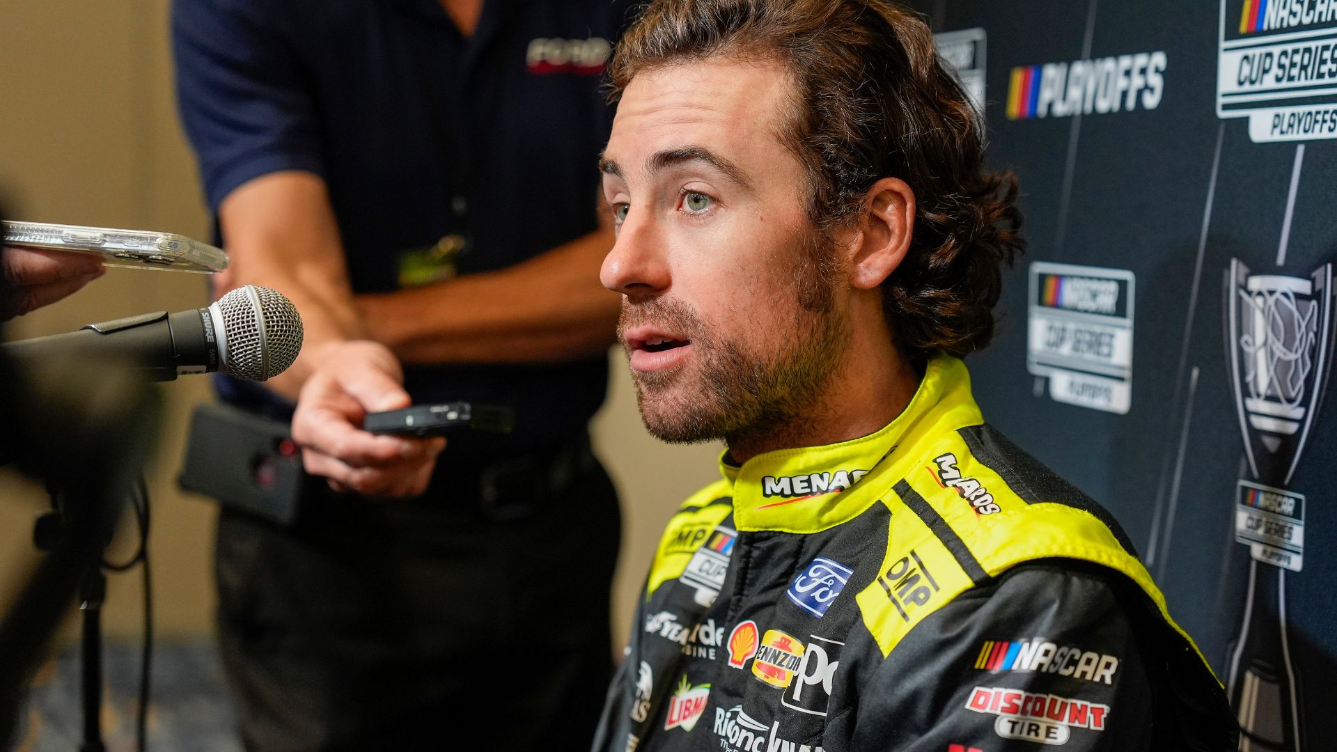 Aug 27, 2025; Charlotte, NC, USA; Ryan Blaney answers questions from the media during NASCAR Cup Series Playoff Media Day at Charlotte Convention Center