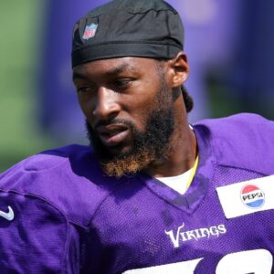 Minnesota Vikings running back Aaron Jones Sr. (33) looks on during the teams training camp at the Minnesota Vikings Training Facility.