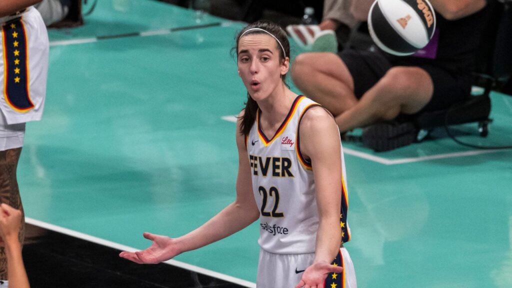 Indiana Fever guard Caitlin Clark (22) reacts during the second half against the New York Liberty at Barclays Center on Sunday