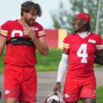Kansas City Chiefs tight end Travis Kelce (87) and wide receiver Rashee Rice (4) walk down the hill to the fields prior to training camp at Missouri Western State University.