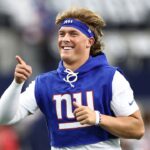 New York Giants quarterback Jaxson Dart (6) warms up before the game against the Dallas Cowboys at AT&T Stadium.