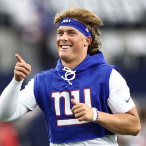 New York Giants quarterback Jaxson Dart (6) warms up before the game against the Dallas Cowboys at AT&T Stadium.