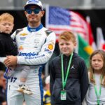 Kyle Larson with children Cooper Larson (left), Owen Larson (center) and Audrey Larson during the 109th Running of the Indianapolis 500 at Indianapolis Motor Speedway.