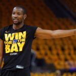 May 12, 2025; San Francisco, California, USA; Golden State Warriors forward Jonathan Kuminga (00) stands on the court during warmups against the Minnesota Timberwolves during game four of the second round for the 2025 NBA Playoffs at Chase Center.