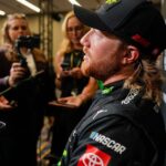 Aug 27, 2025; Charlotte, NC, USA; Tyler Reddick answers questions from the media during NASCAR Cup Series Playoff Media Day at Charlotte Convention Center