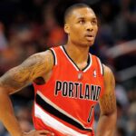 Portland Trail Blazers guard Damian Lillard (0) stands on the court during the game against the Phoenix Suns in the first half at US Airways Center.