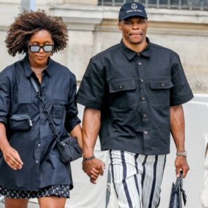 Russel Westbrook and his wife Nina Exiting the Mens Spring Summer 2023 Louis Vuitton fashion show at cour Carrée du Louvre in Paris, France