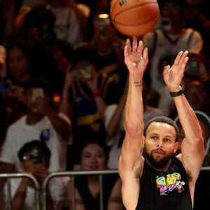USA star Stephen Curry offers coaching sessions for young players during his 2025 Curry Brand China Tour at the Chongqing International Expo Center on August 20, 2025 in Chongqing, China.
