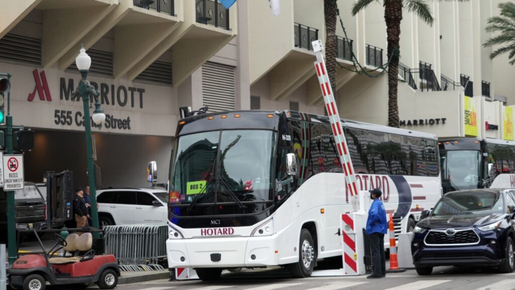 Kansas City Chiefs team buses leave the New Orleans Marriott prior to Super Bowl LIX.