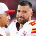 Kansas City Chiefs tight end Travis Kelce (87) with quarterback Patrick Mahomes (15) against the Arizona Cardinals during a preseason NFL game at State Farm Stadium.