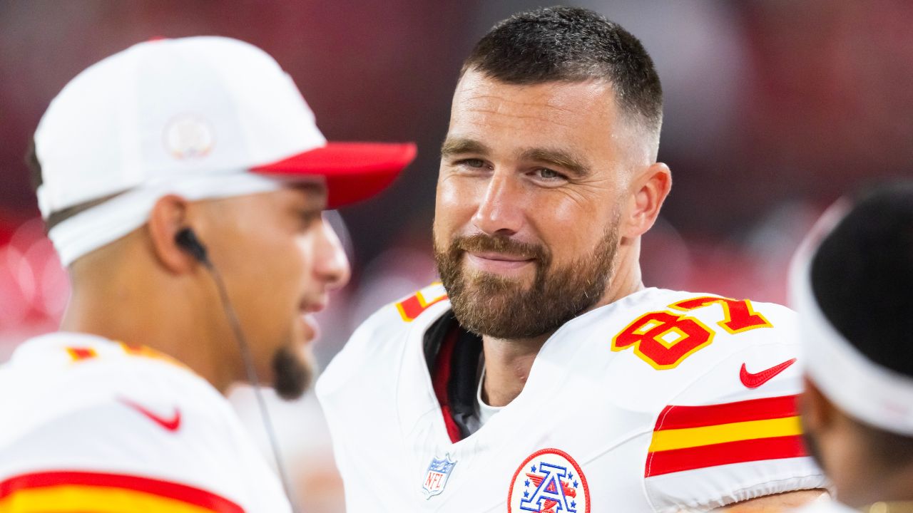 Kansas City Chiefs tight end Travis Kelce (87) with quarterback Patrick Mahomes (15) against the Arizona Cardinals during a preseason NFL game at State Farm Stadium.