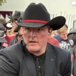 ESPN's Pat McAfee arrives on the set of College GameDay in Norman on Saturday.