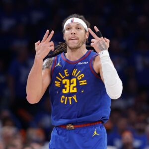 May 13, 2025; Oklahoma City, Oklahoma, USA; Denver Nuggets forward Aaron Gordon (32) gestures after scoring against the Oklahoma City Thunder during the second half of game five of the second round for the 2025 NBA Playoffs at Paycom Center.