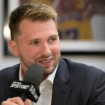 Los Angeles Lakers Luka Doncic (77) is interviewed Spectrum SportsNet following a press conference announcing the signing of his contract extension at UCLA Health Training Center.