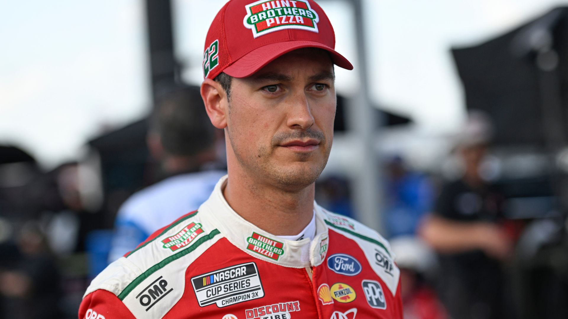 Sep 6, 2025; Madison, Illinois, USA; NASCAR Cup Series driver Joey Logano (22) looks on during practice and qualifying for the Enjoy Illinois 300 at World Wide Technology Raceway.